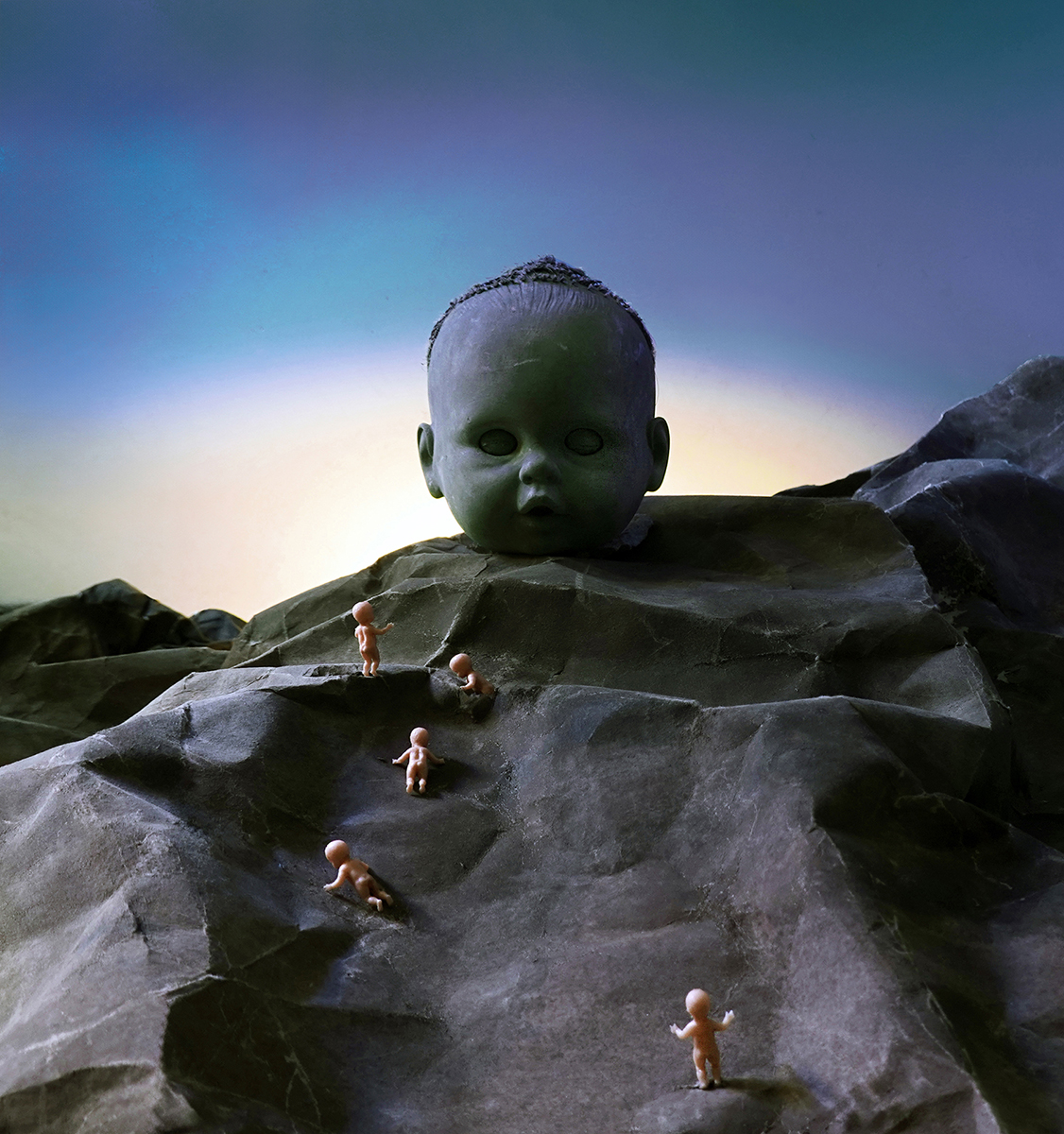 Doll head, babies, baby dolls, mountain, surreal landscape, surrealism, mountain climbing, surreal landscape photography, babies climb mountain