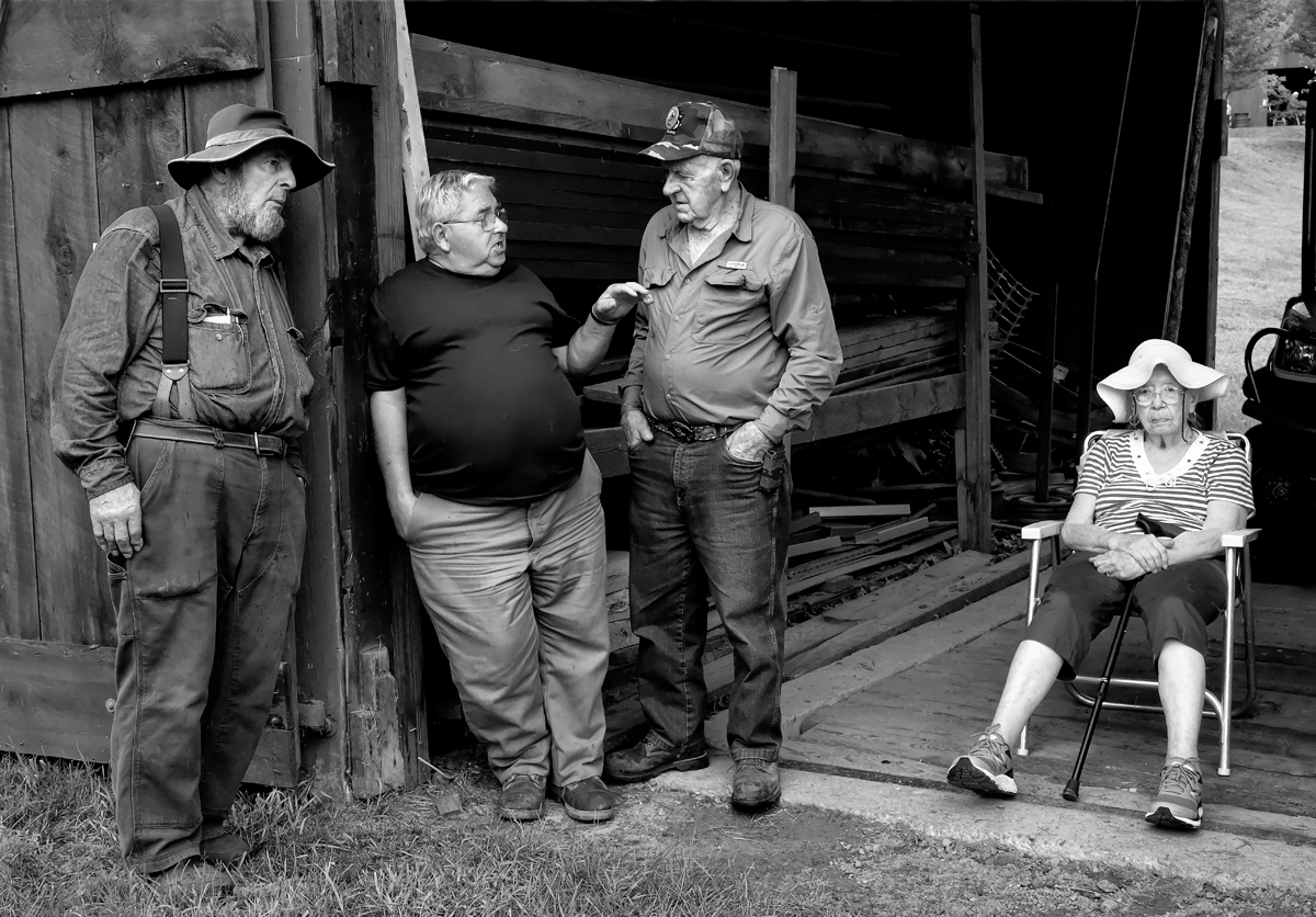 Street photography, old timers, codgers, rustic scene, Cornish Fair, Old lady ignored, wife left out, NH